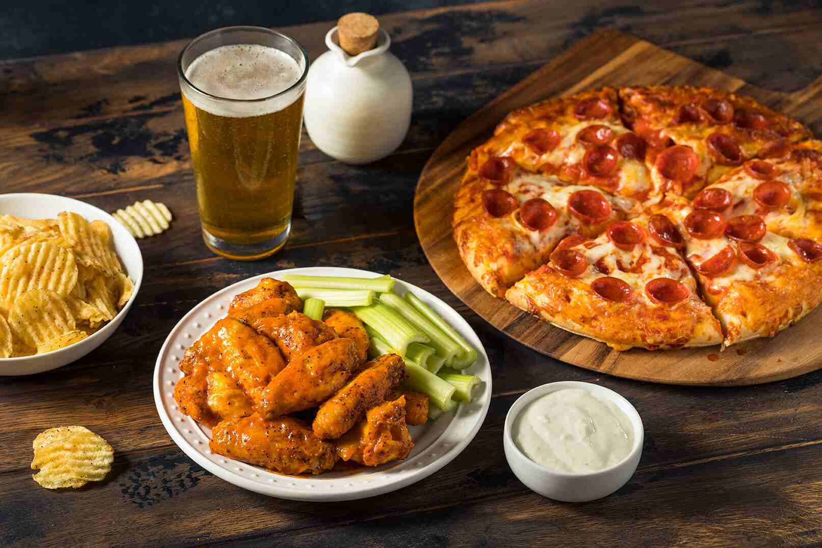 buffalo wins, celery, beer, chips, pizza, ranch, appetizers and more