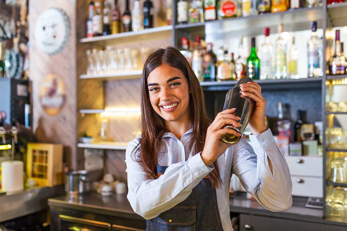 Bartender shaking a mixed drink