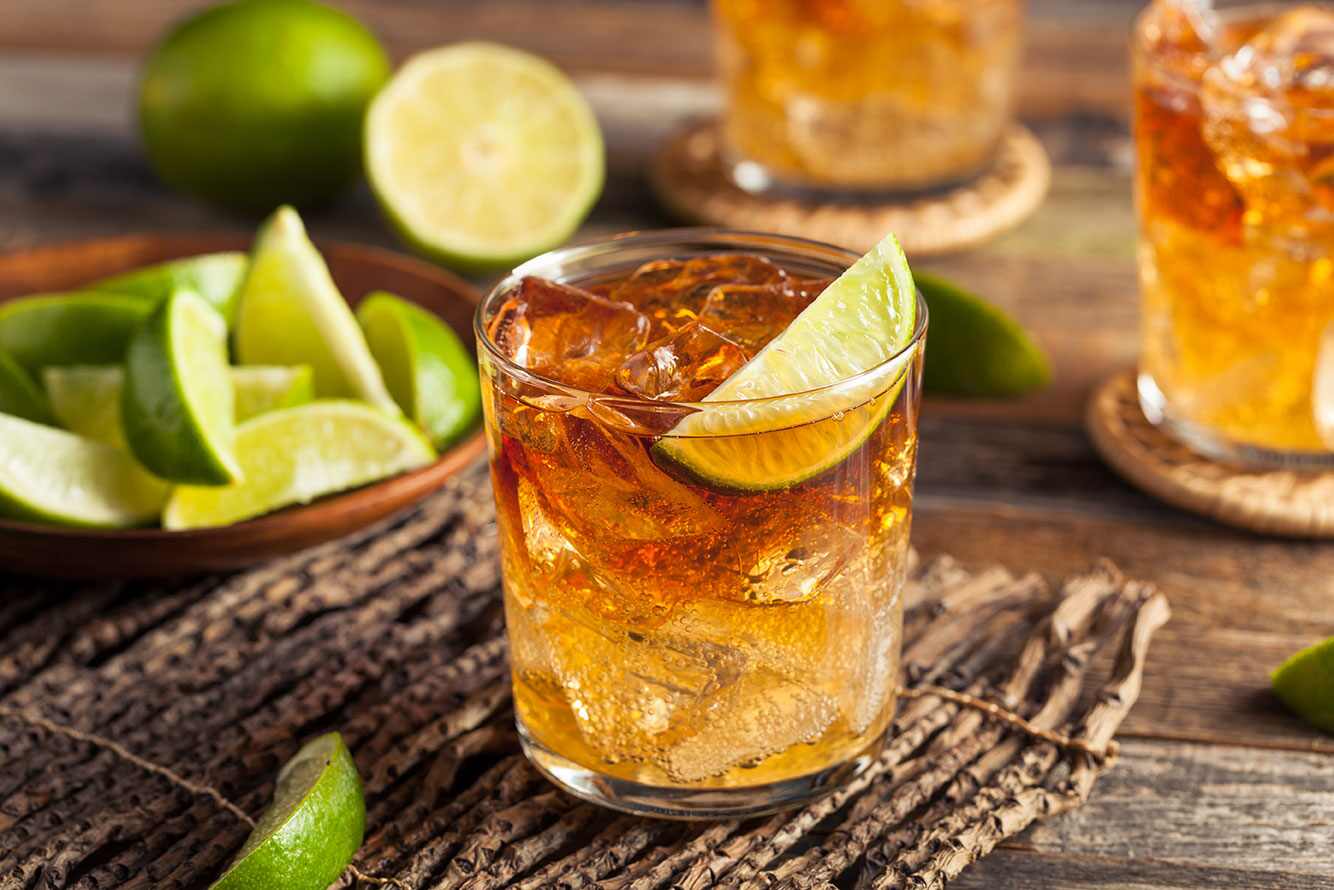 Whiskey drink with a lime